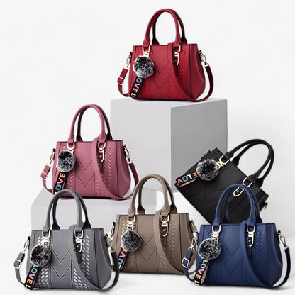 Stylische Leder-Messenger-Tasche mit weichem Pompon