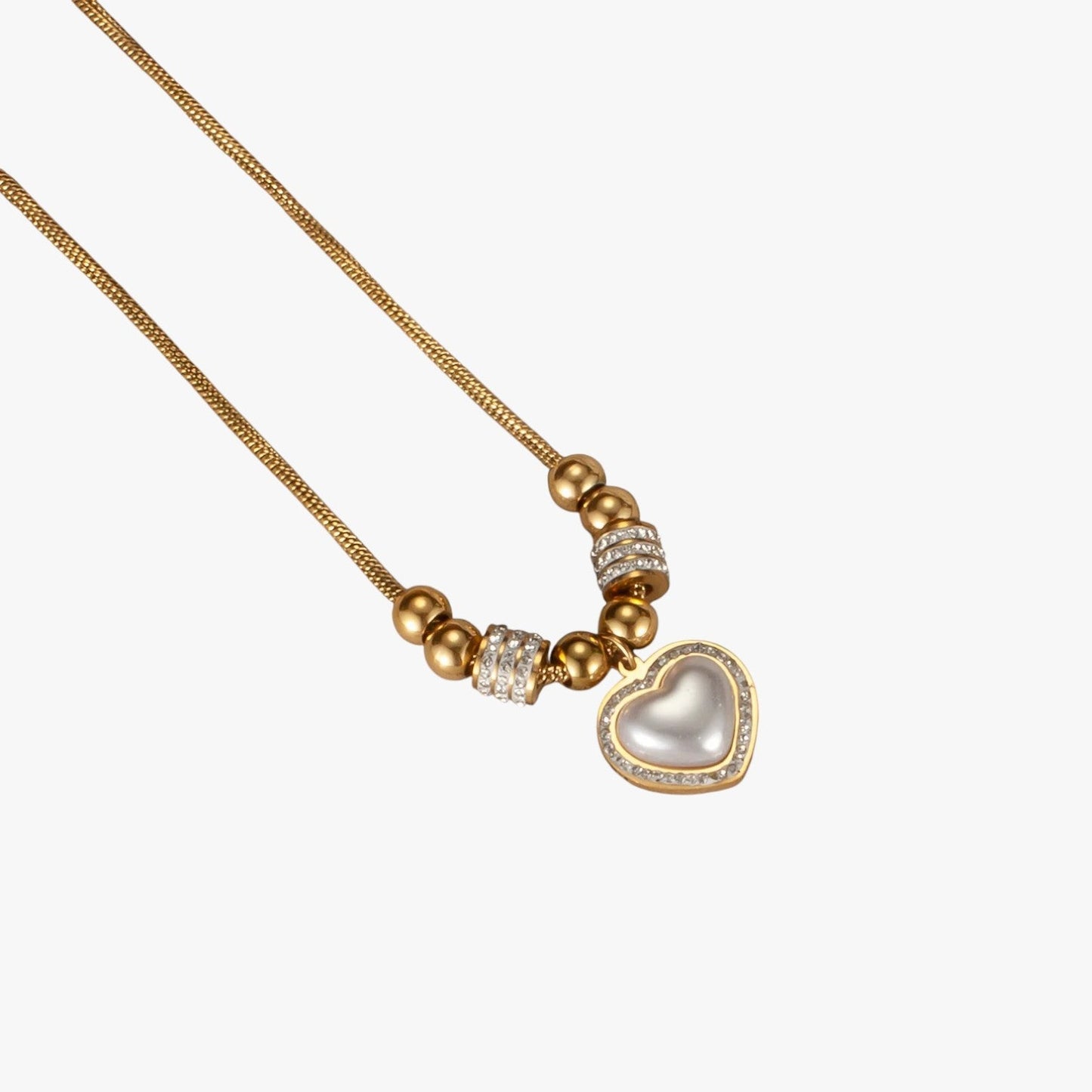 Mariela | Halskette in Herzform mit Zirkonia und Perlen für einen Party-Look