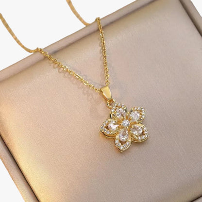 Winnie | Halskette mit rotierender Blume aus Gold und Zirkonia