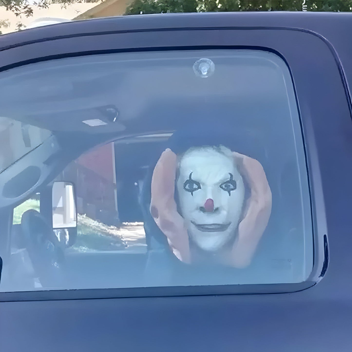 Hängende Clownmaske - Gruselige Halloween-Dekoration