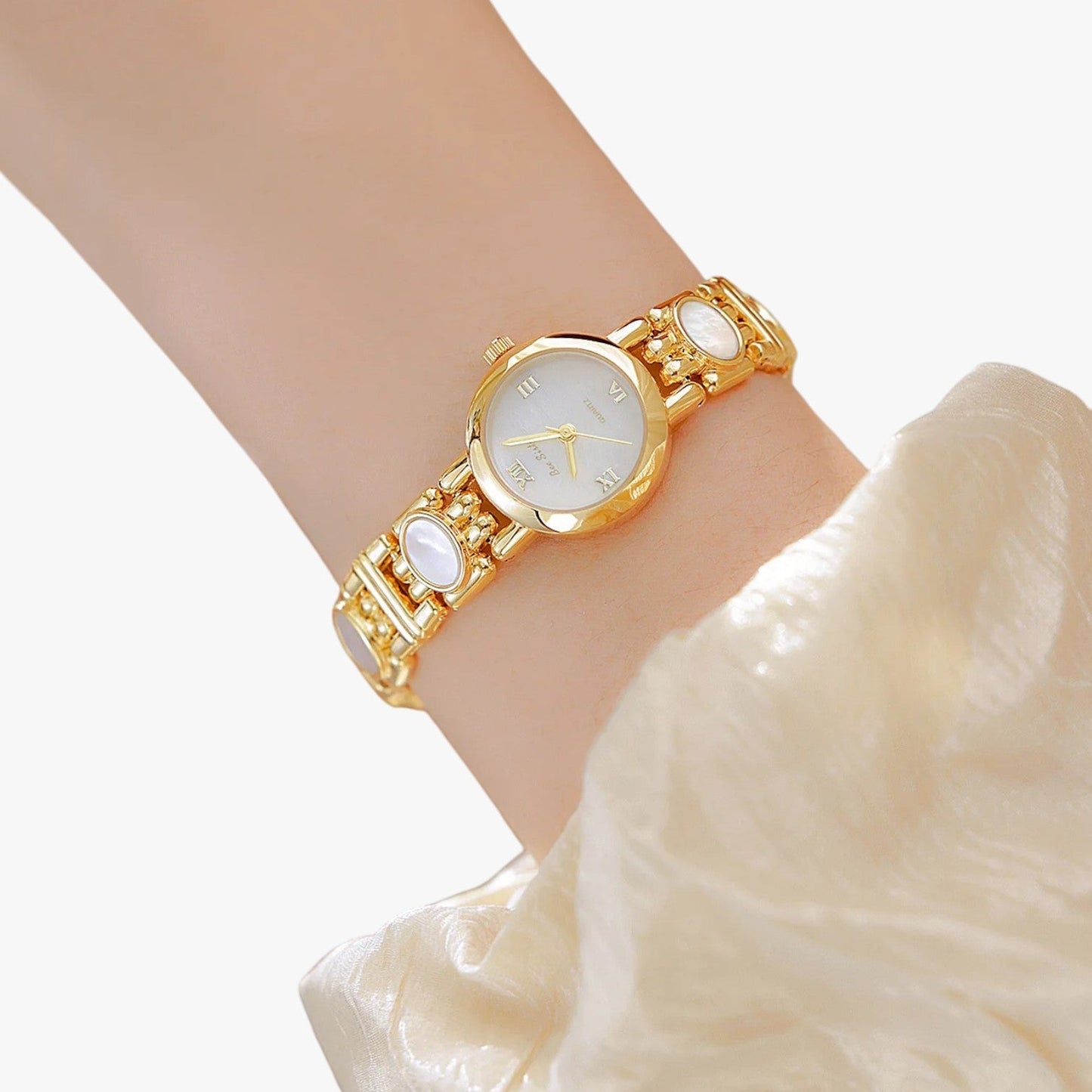 Mira | Elegante Armbanduhr mit Perlmutt-Muschelhalsband