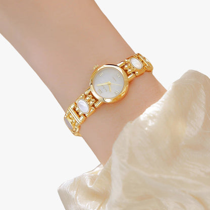 Mira | Elegante Armbanduhr mit Perlmutt-Muschelhalsband