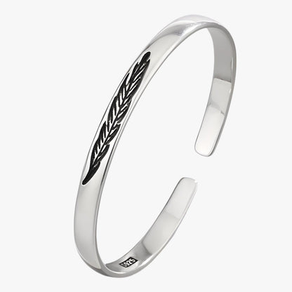 Jayce | Armband aus 925er Silber mit Goldener Feder im Vintage Punk Stil